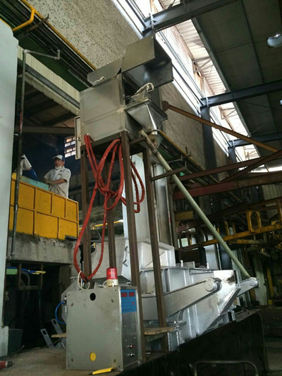 高強(qiáng)度球磨鑄鐵自動孕育添加裝置